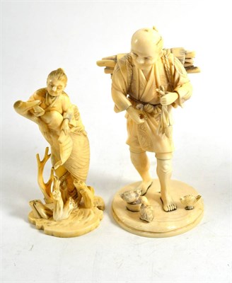 Lot 353 - A Japanese sectional elephant ivory peasant with faggots and a smaller group of a sage with...