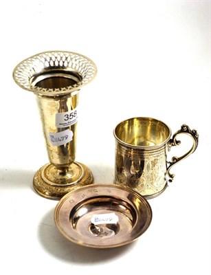 Lot 358 - A Victorian silver christening mug, Sheffield 1876; a silver trumpet vase, Birmingham 1917, loaded