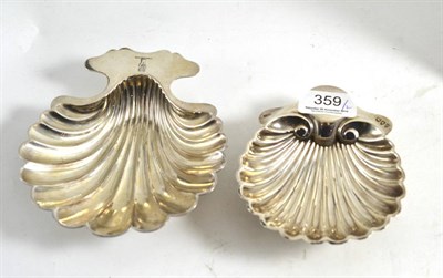 Lot 359 - A late Victorian silver scallop shell butter dish, London 1895 and plated example by Elkington & Co