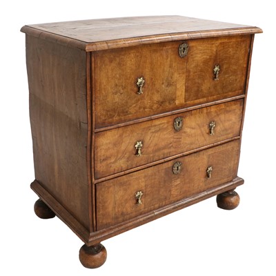 Lot 833 - A Walnut and Featherbanded Straight-Front...