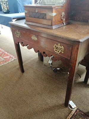 Lot 1225 - An 18th Century Oak Lowboy, fitted with a...