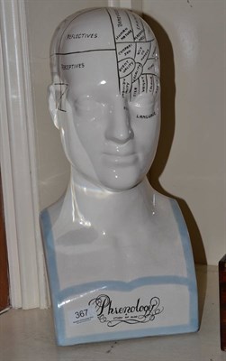 Lot 367 - A copy of a pottery phrenology bust with various labels sections of the skull identified, with...