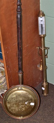 Lot 373 - A reproduction ship's type barometer and a bed warming pan (2)