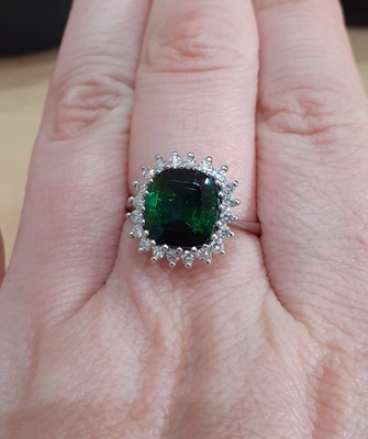 Lot 2108 - An 18 Carat White Gold Green Tourmaline and...