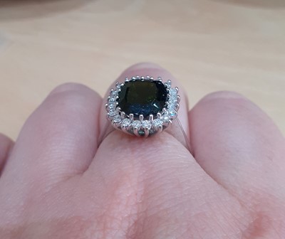 Lot 2108 - An 18 Carat White Gold Green Tourmaline and...