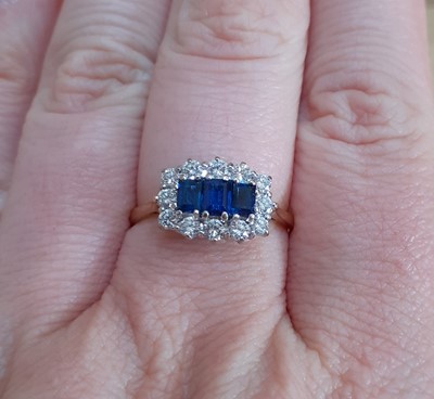 Lot 2165 - An 18 Carat Gold Sapphire and Diamond Cluster...