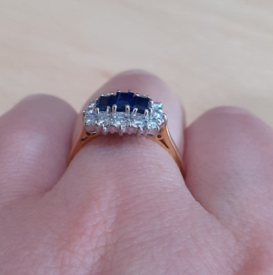 Lot 2165 - An 18 Carat Gold Sapphire and Diamond Cluster...