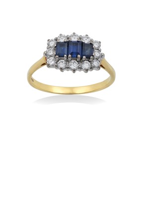 Lot 2165 - An 18 Carat Gold Sapphire and Diamond Cluster...