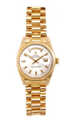 Lot 2171 - Rolex: An 18 Carat Gold Automatic Day/Date...