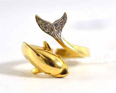 Lot 400 - A Sanibel Island, Florida gold and diamond set dolphin ring