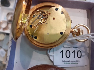 Lot 1010 - An 18 Carat Gold Half Hunter Pocket Watch