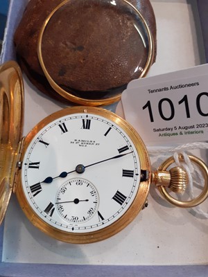 Lot 1010 - An 18 Carat Gold Half Hunter Pocket Watch