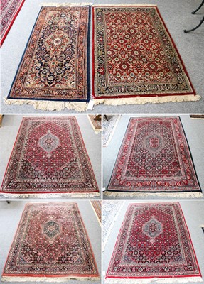 Lot 1212 - An Indian Rug, the raspberry Herati field with...