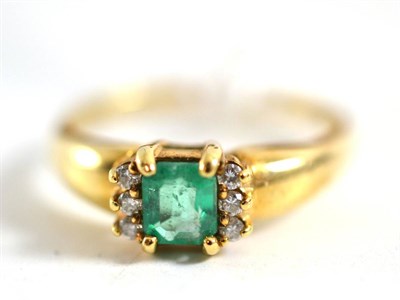 Lot 419 - An emerald and diamond ring stamped ";10k"; and ";Corona"