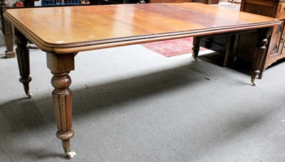 Lot 1192 - A Victorian Extending Table, with two...