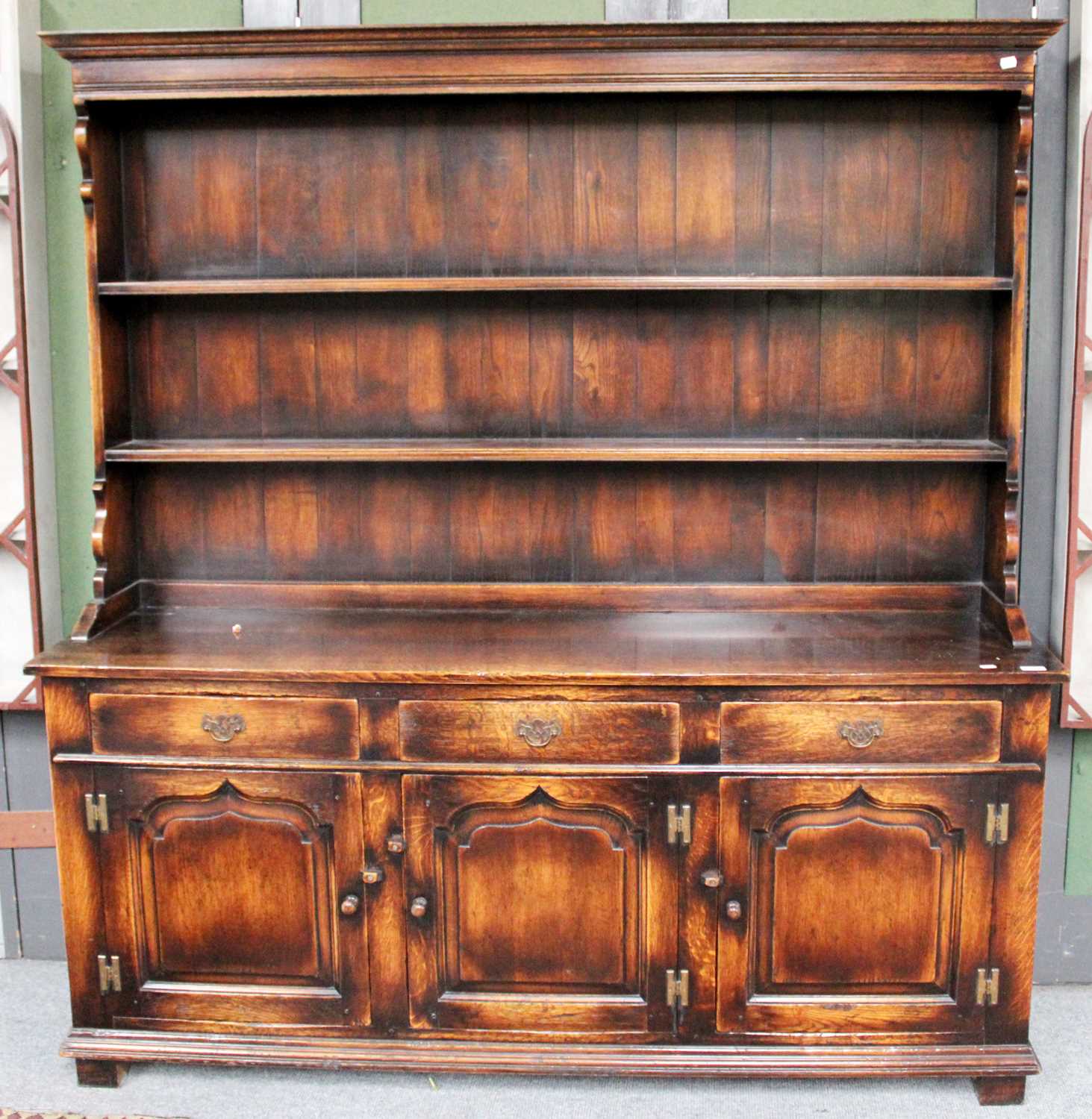 Lot 1389 - A Rackstraw Oak Dresser and Rack in George