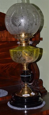 Lot 442 - Yellow glass oil lamp