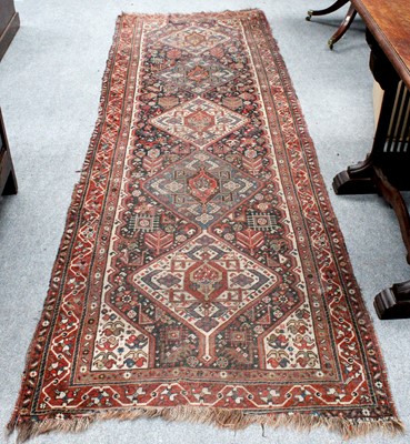 Lot 1200 - A Kashgai Runner, the indigo field with a...