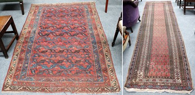 Lot 1206 - Malayer Runner, the coral pink field of boteh...