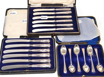 Lot 466 - A cased set of brightcut silver teaspoons and two cased sets of six silver handled tea knives (3)