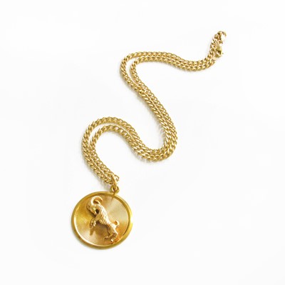 Lot 1063 - An Aries Pendant on A 9 Carat Gold Chain,...