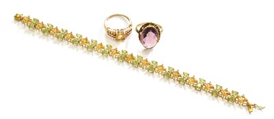 Lot 1084 - A 9 Carat Gold Citrine and Peridot Bracelet,...