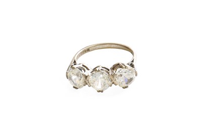 Lot 1090 - An 18 Carat Gold Colourless Three Stone Ring,...