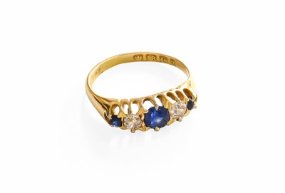 Lot 1081 - An 18 Carat Gold Sapphire and Diamond Five...