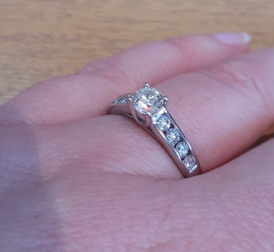 Lot 2053 - An 18 Carat White Gold Diamond Solitaire Ring...