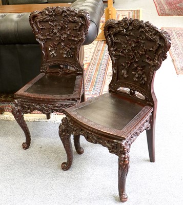 Lot 1268 - A Pair of 20th Century Chinese Carved Hardwood...