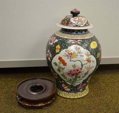 Lot 483 - A large Chinese famille rose et noir baluster vase and cover (a.f.)