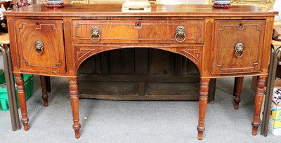 Lot 1126 - An Early 19th century Bowfront Mahogany...