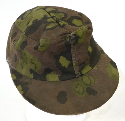 Lot 101 - A Second World War German SS Field Cap, in...