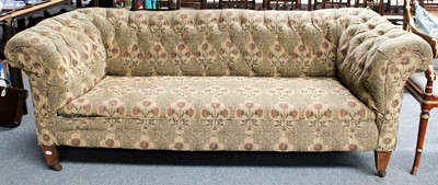 Lot 1174 - A Chesterfield Sofa, recovered in button...