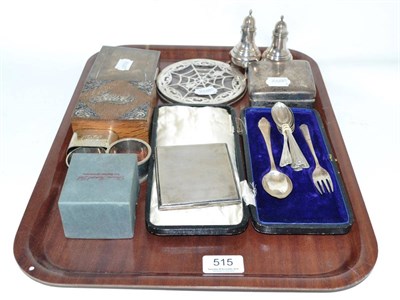 Lot 515 - A tray of silver ware including two cigarette boxes, teapot stand, a pair of pepperettes,...