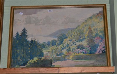 Lot 522 - Alfred Heaton Cooper (1864-1929), View in the Lake District from a formal garden, signed and...