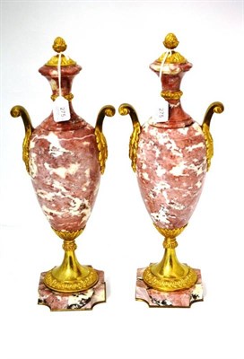 Lot 275 - A Pair of Ormolu Mounted Pink Marble Urns, late 19th/early 20th century, with pine cone...