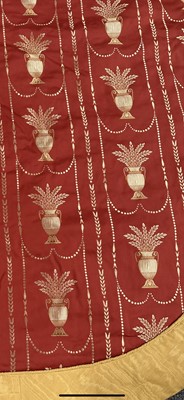Lot 86 - A Bed Throw, modern, covered in red and gold...