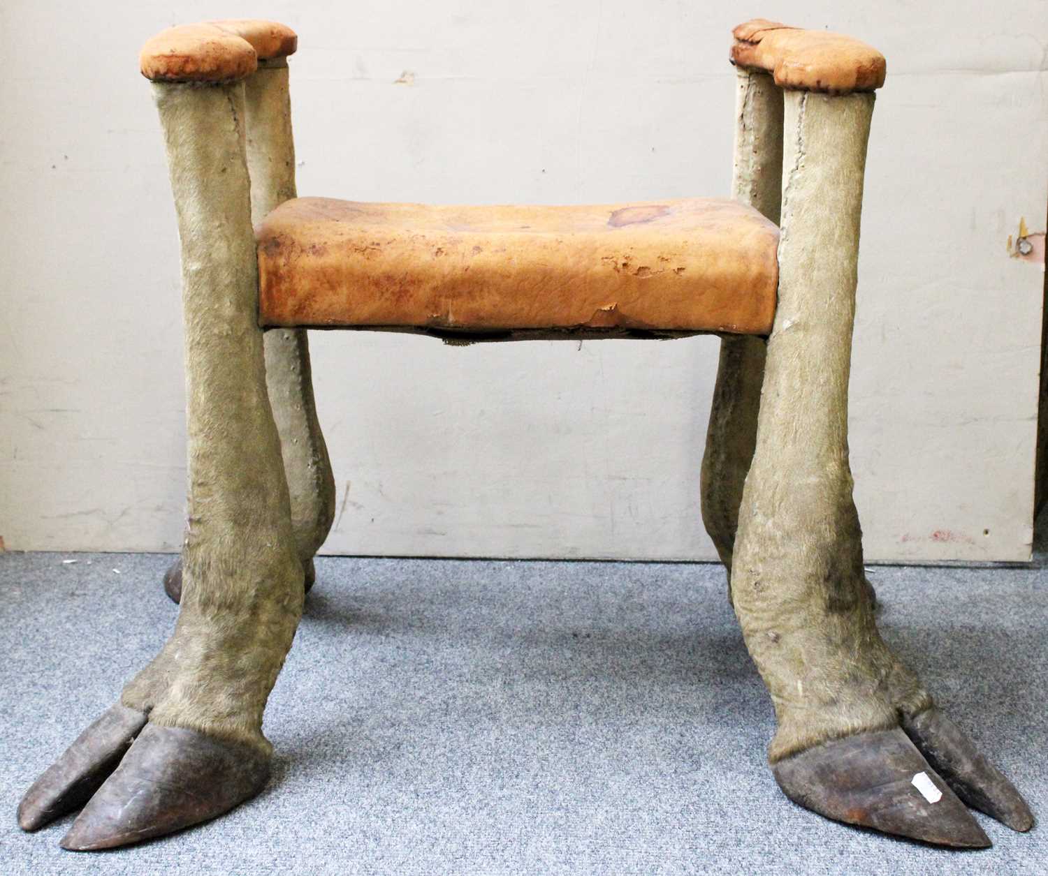 Lot 1200 - A Camel Leg Stool