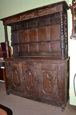 Lot 607 - Large carved oak dresser