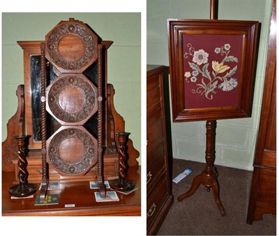 Lot 609 - A mahogany pole screen, an oak cake stand and a pair of candlesticks