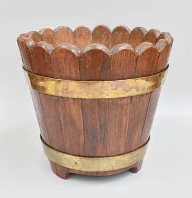 Lot 112 - A Staved Oak Planter, brass bound and with...