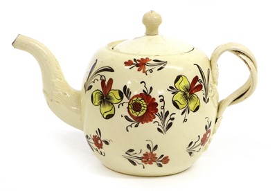 Lot 47 - A Creamware Teapot and Cover, circa 1770, with...