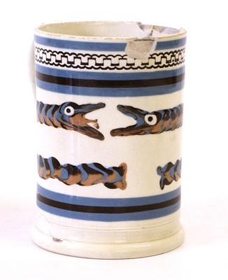 Lot 48 - A Mochaware Mug, circa 1800, decorated in...