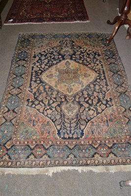 Lot 623 - Sarough rug, West Persia, the indigo field of angular vines around a central medallion framed...