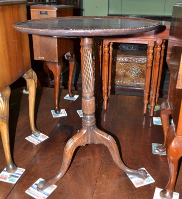 Lot 630 - A mahogany tip top tripod table