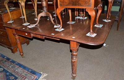 Lot 631 - A Victorian mahogany extending dining table with two leaves