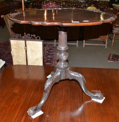 Lot 635 - A mahogany tilt top tripod table with piecrust edge