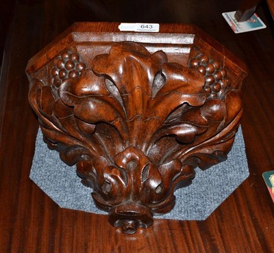 Lot 643 - A carved oak bracket