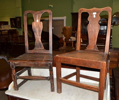 Lot 644 - A pair of elm side chairs